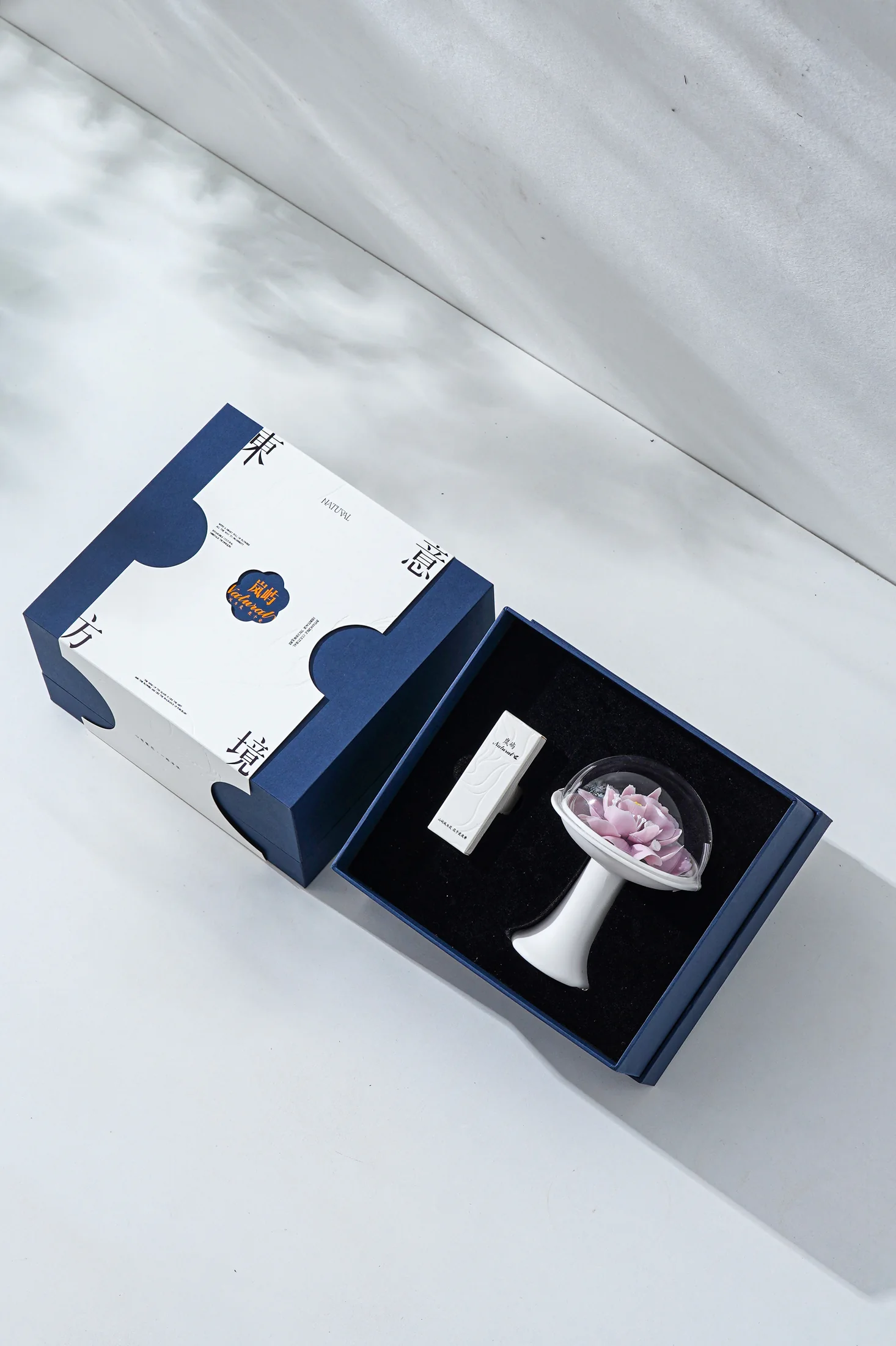 Anteluxe porcelain fragrance gift set in a blue presentation box